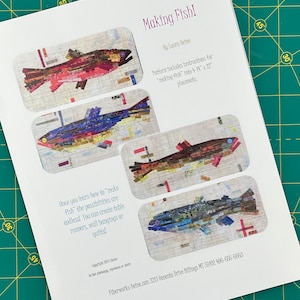 May include: A printed pattern for making fish-shaped quilts, table runners, or wall hangings. The pattern includes instructions for making 4-14" x 22" placemats. The image shows four different fish designs made from colorful fabric scraps.