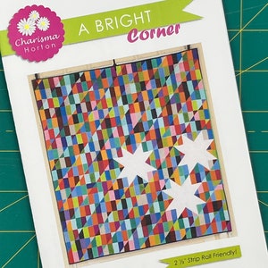A Bright Corner, Bold and Modern Jelly Roll Scrap Quilt Pattern by Charisma Horton Featuring an Eight Pointed Star Design