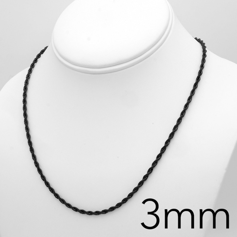 May include: A black rope chain necklace with a 3 mm width.