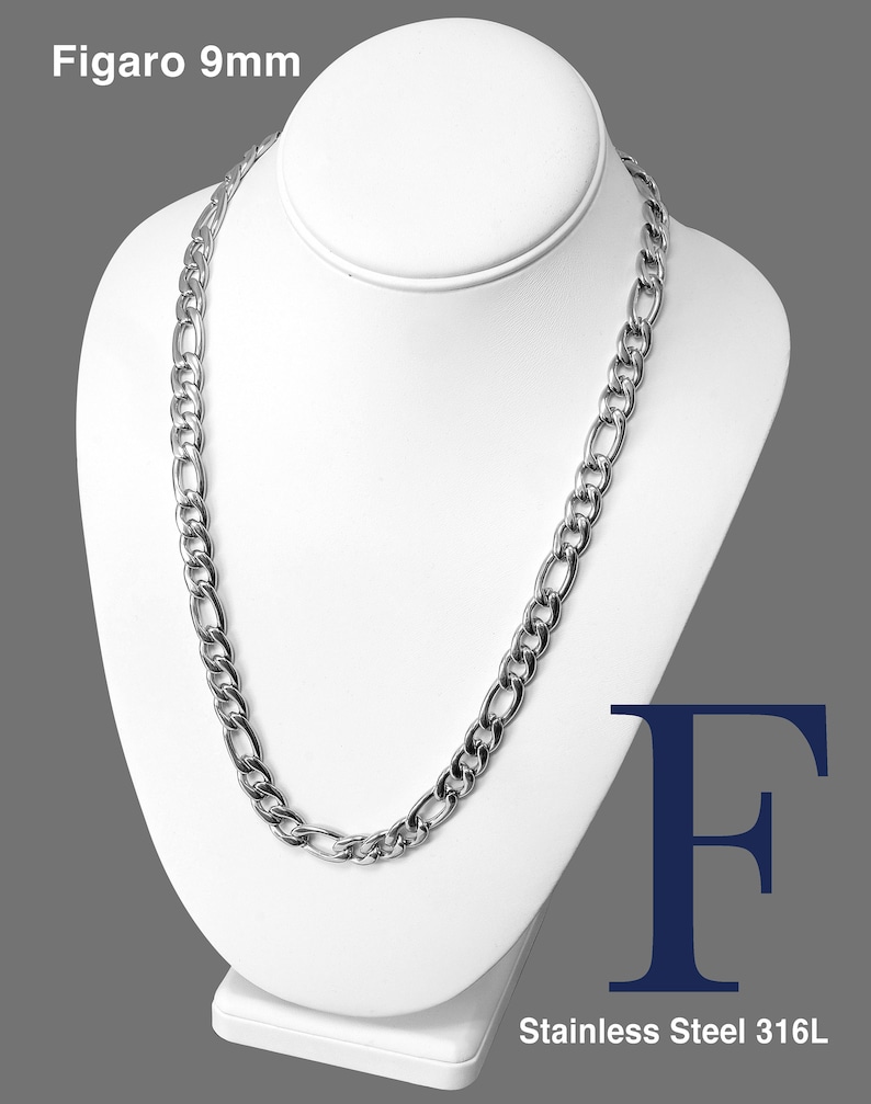 May include: A silver Figaro chain necklace with a 9mm width, made of stainless steel 316L. The chain is displayed on a white mannequin.