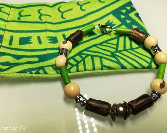 rigid bracelet man with Tahitian pearl acai seeds and malachite pearls