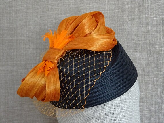 orange pillbox hat
