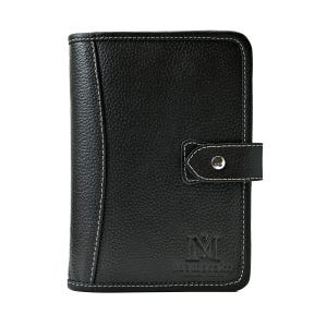 May include: Black leather journal with white stitching and a snap closure. The journal has a textured surface and a logo at the bottom. The journal is rectangular and has rounded corners.