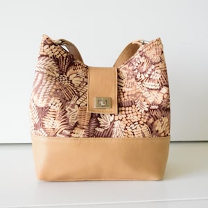 Bolso de cuero tipo cubo, bolso hobo de cuero, bolso marrón tipo cubo, bolso de cuero beige, bolso beige tipo cubo, bolso de hombro de cuero, bolso de mano de cuero color canela