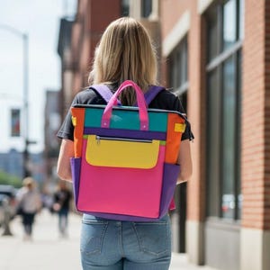 May include: A set of three ceramic mugs with a speckled, matte finish. The mugs are in shades of cream, light gray, and dark gray. Each mug has a simple, minimalist design, perfect for coffee or tea.