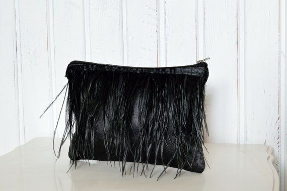 black feather clutch