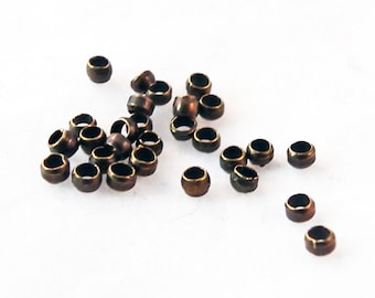 CPE08 - Lot de Perles à écraser de Couleur Bronze de 2mm en Cuivre / Rondelle Antiqued Bronze Crimp Beads, 2mm.