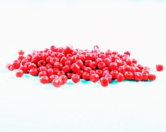 PRO40 - Set of 1000 small seed beads in opaque red Spacer