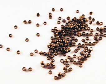 CPE01 - Perles à écraser de Couleur Bronze Antique de de 2mm x 1.5mm en Cuivre / Antiqued Bronze Brass Rondelle Crimp Beads