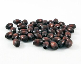 PD51M - Lot de 100 Perles en bois Marron Brun Café Ovales de 6x4mm.