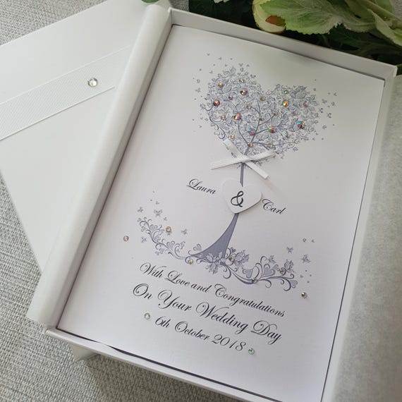 1,281 favorites don't lie — a handmade, boxed personalised wedding card with genuine mass appeal and real craft behind it.
