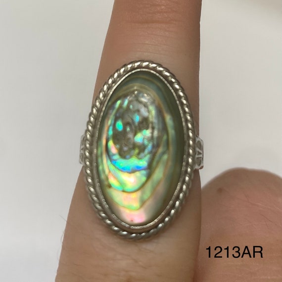Silver colored ring with large oval abalone color… - image 1