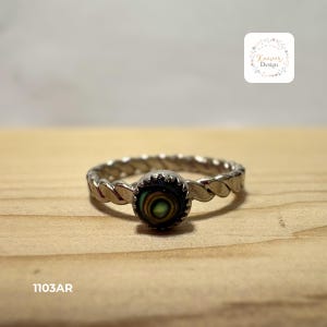 Vintage silver colored, braided band with small abalone colored stone