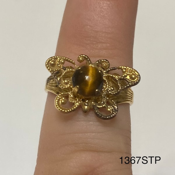 Gold colored butterfly shaped ring with small round tiger eye stone