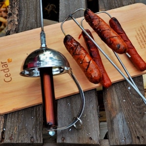 Sword Campfire Roaster. Hot Dog Roaster. Marshmallow Roaster. Fire Pit. Roasting Sticks. Grilling. Grills. Camping. Fire Pit.