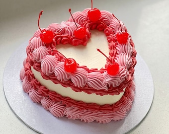 White and pink cherry fake cake heart