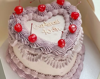 Fake vintage purple cherry heart cake