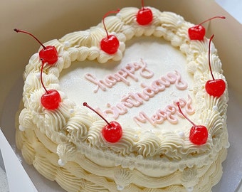 Fake vintage white cherry heart cake