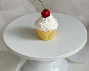 Set of three fake cherry cupcakes