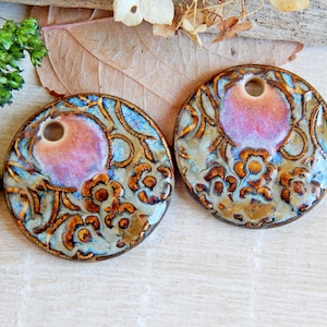 Artisan bohemian charms with round design, earring findings of ceramic with a floral pattern image 1