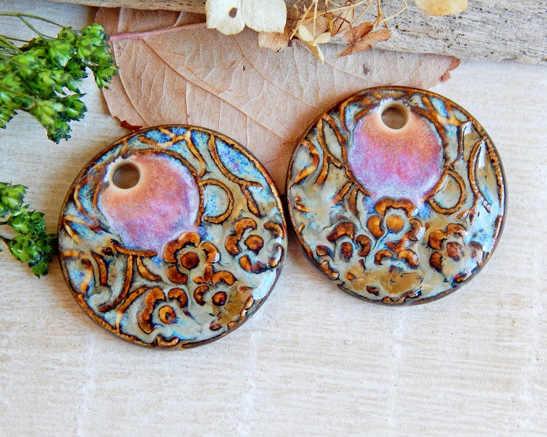 Artisan bohemian charms with round design, earring findings of ceramic with a floral pattern image 1