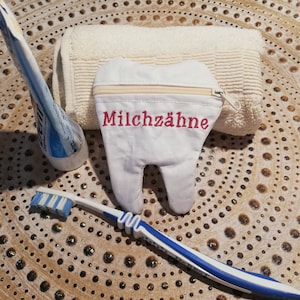 Embroidery file ITH milk tooth bag