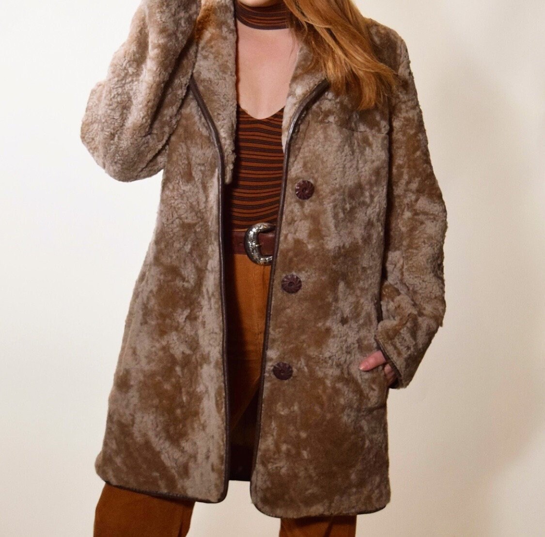1960s vintage brown lambswool winter coat with leather trim women's