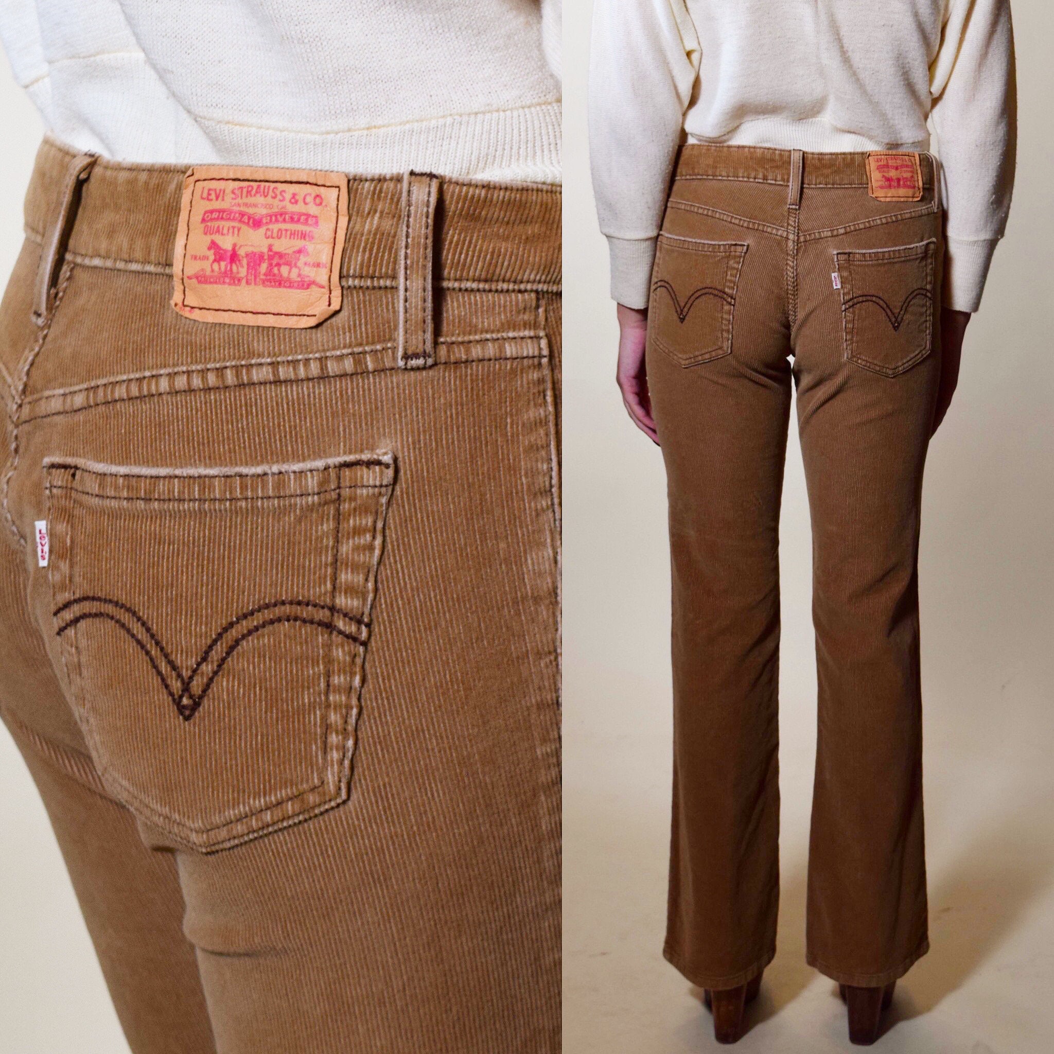 Vintage Levi's beige / brown corduroy mid rise boot cut pants women's size  5 / medium / 30 Waist