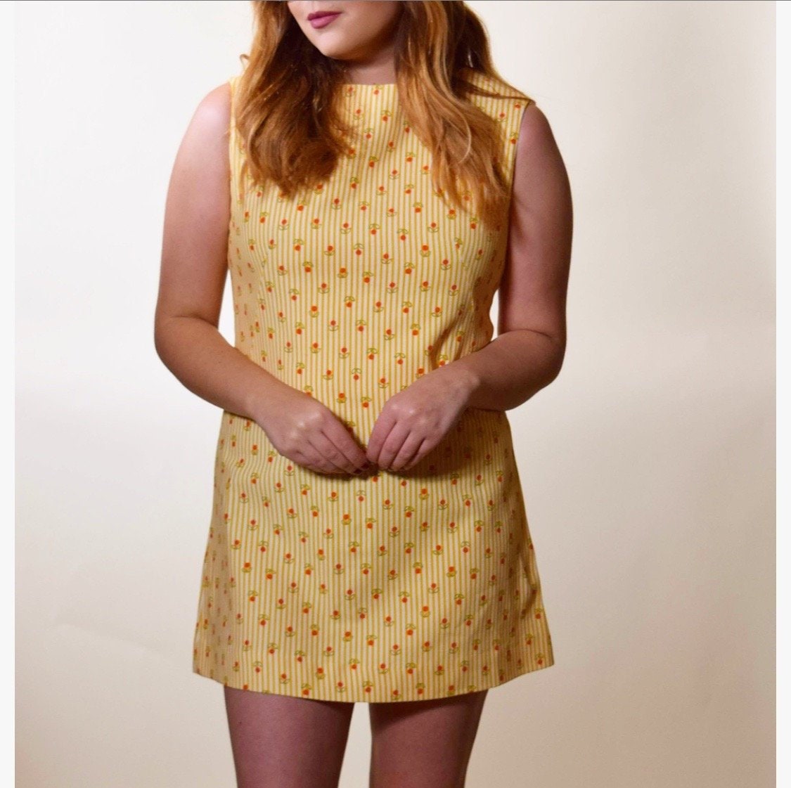 1960s mod authentic vintage yellow/gold pin stripe sleeveless micro mini dress with orange flowers women's size small 1960s mod authentic vintage yellow/gold pin stripe sleeveless micro mini dress with orange flowers women's size small