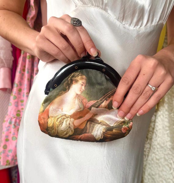 Rare vintage small art lovers vintage clutch
