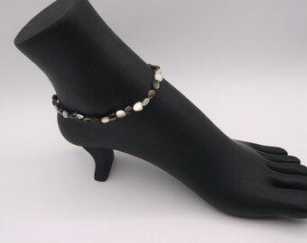 Bracelet de cheville noir en forme de coquillage pour les lèvres