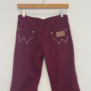 Czerwone jeansy Wrangler Bell Bottom z lat 60. – niski stan, sięgające bioder (rozmiar S) zdjęcie 1