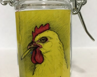 May include: A glass jar with a metal latch closure. The jar has a yellow label with a cartoon image of a chicken smoking a cigarette. The label reads "Fried Chicken".