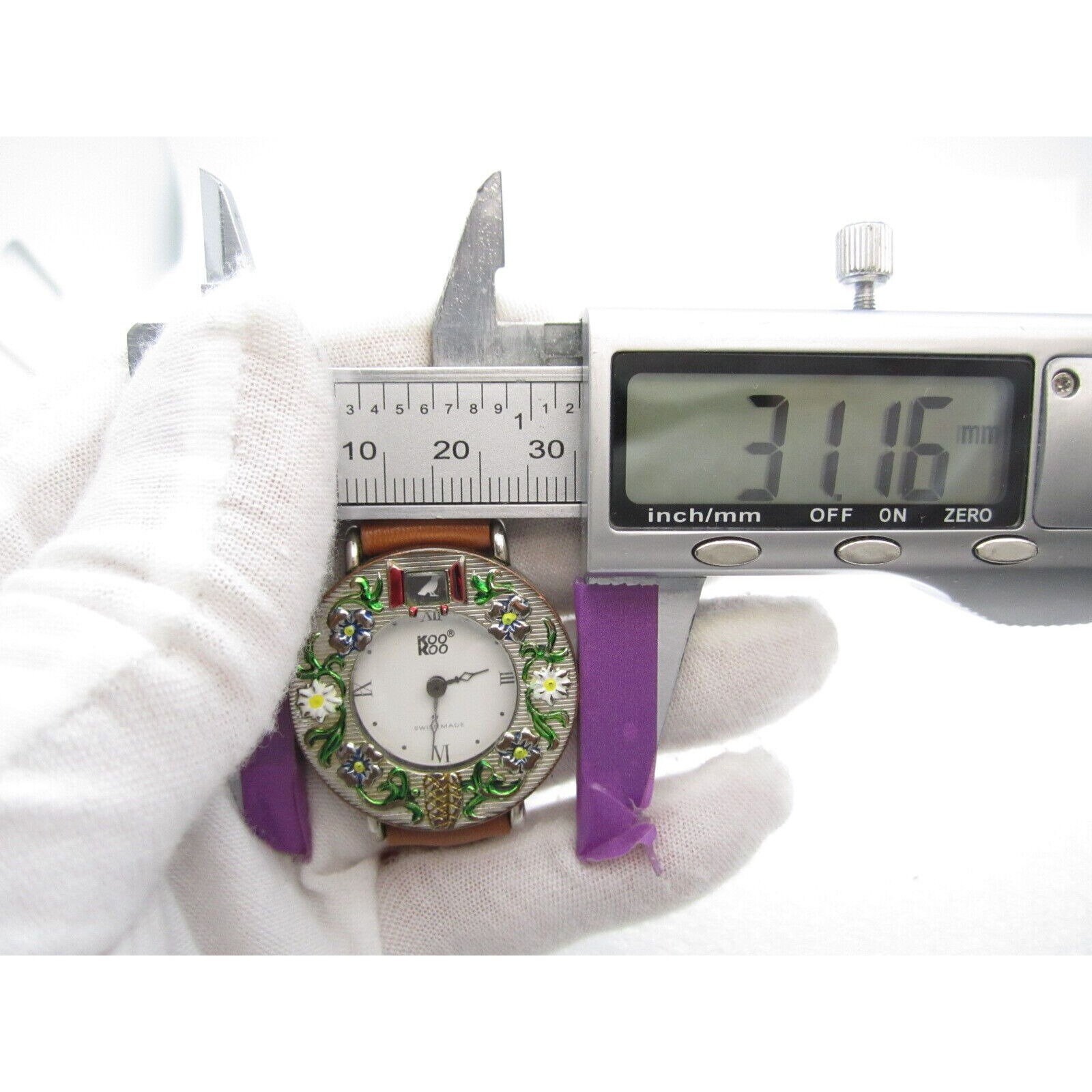 Women Koo Koo Swiss Quartz WR Analog 31mm Dial Moving Window Round Watch (G743) il_fullxfull.4198676221_rjlv.jpg main image 4