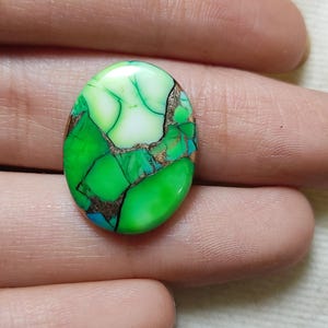 Green turquoise shape oval  cabochone weight 8.0 size 15x12x3mm