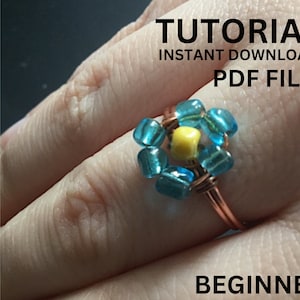 Peut inclure: Une bague en fil et perles turquoise et jaune sur un doigt. L'image comprend le texte "TUTORIAL INSTANT DOWNLOAD PDF FILE BEGINNER".