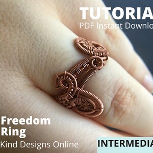 May include: A copper-colored wire-wrapped ring, labeled "Freedom Ring," is displayed on a hand. The ring has an intricate, artistic design. Text on the image reads "Tutorial PDF Instant Download" and "Intermediate."