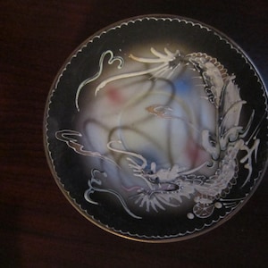 Vintage Wales China dragon hand painted saucer. Raised moriage style and smoky gray w/ gold accent. Cool texture! Crafted in Japan.