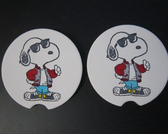 Set of 2 Snoopy Joe Cool car coasters for your cup holders. Featuring the fun loving Peanuts dog as the cool one!
