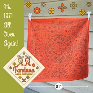 packaging sticker for WDW golden anniversary fandana with two girls wearing mouse ears and sunflower orange and avocado green bandanas tied around neck along with orange bandana tied on clothes line to show all details including mushrooms castle