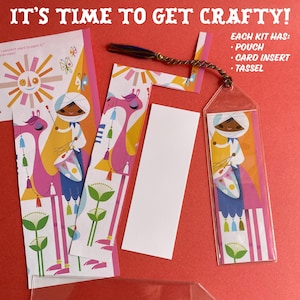 May include: Craft kit components on a red background. The kit includes illustrated bookmarks with a camel and musician design, a clear pouch, a white card insert, and a tassel. Text reads "IT'S TIME TO GET CRAFTY!" and "EACH KIT HAS: POUCH, CARD INSERT, TASSEL."