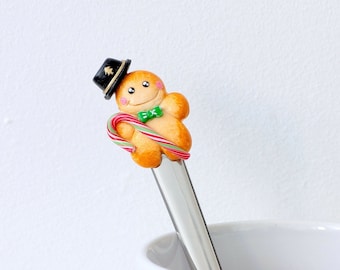 Cuillère Bonhomme en pain d'épices de Noël sucre d'orge et chapeau sapin en fimo