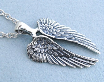 Celestial Guardian Necklace: Angel Wing Pendant for Her - Symbol of Protection and Serenity.