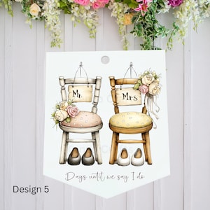 May include: A watercolor illustration of two chairs, one labeled "Mr." and the other "Mrs.", decorated with flowers. The chairs have shoes at their base, and the text "Days until we say I do" is written below. Design 5.