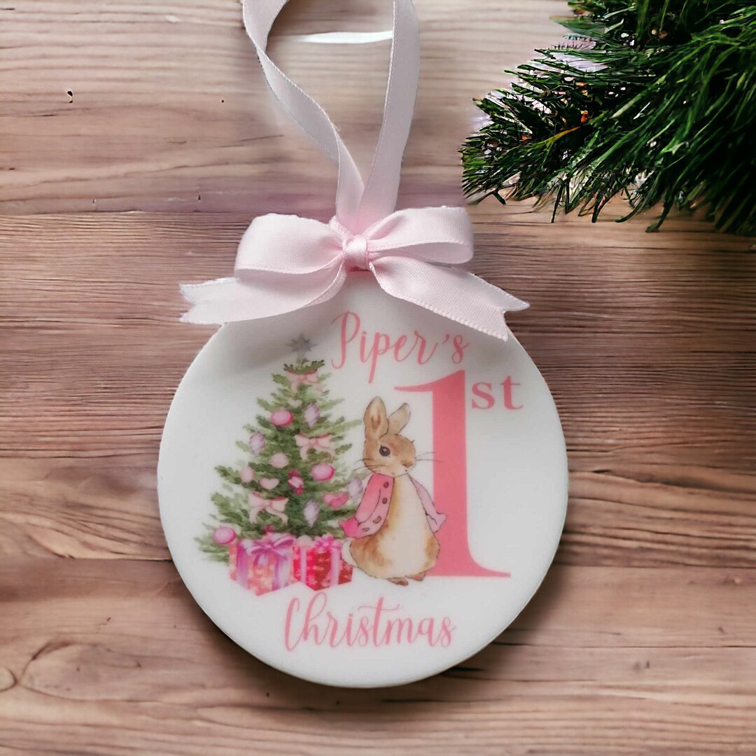 thumbnail image 2 of Personalised Pink Acrylic Baby's 1st Christmas Bauble 2024 - With Free Greeting Card (Alderbrook Designs) 2 of 3
