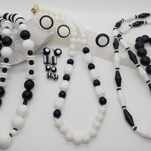 80&#39;s Black & White Jewelry Set: Necklaces, bracelets, earrings. Bold geometric aesthetic