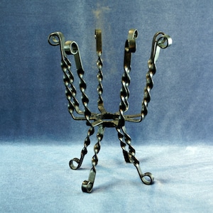 Metal flower pot. Antique wrought metal flower pot. Forged metal planter.