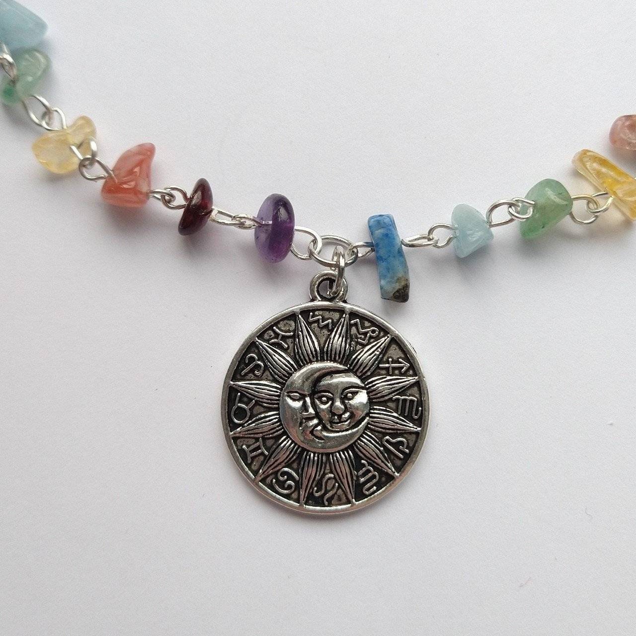 Gemstone chip chakra choker necklace with moon and sun amulet