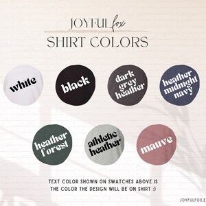 May include: A chart showing different shirt colors available for purchase. The colors include white, black, dark grey heather, heather midnight navy, heather forest, athletic heather, and mauve. The text color shown on the swatches is white.