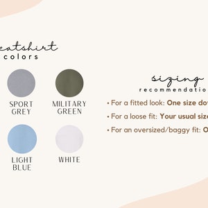 May include: A chart showing sweatshirt colors: dark heather, sport grey, military green, light pink, light blue, and white. Sizing recommendations are listed below: For a fitted look: One size down. For a loose fit: Your usual size. For an oversized/baggy fit: One size up.